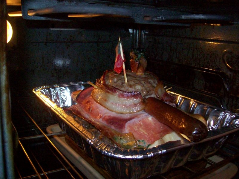 Illustration for article titled 10 Meat Structures That Require Engineering Degrees to Build and a Death Wish to Eat